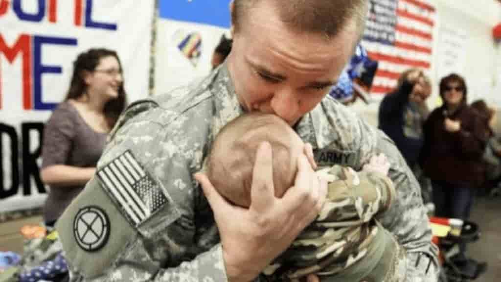 The emotional moment of being reunited with the soldier’s newborn child 