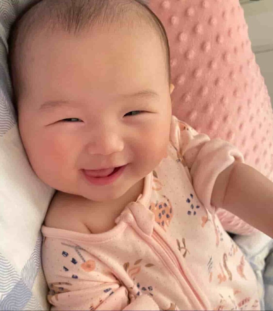 Heartwarming moment: A baby’s laughter brings joy to a mother’s soul.