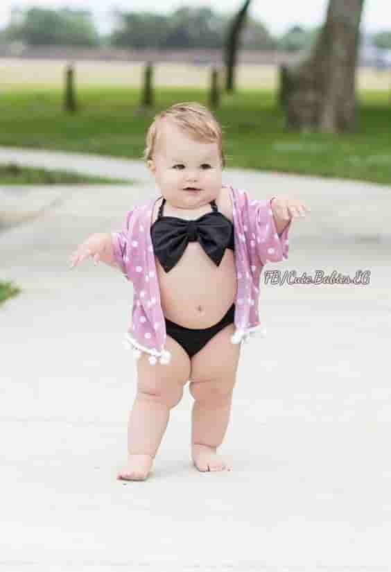 Veronica, a 9-month-old baby girl, captivated everyone on the beach with her chubby, cute beauty when posing on the romantic beach