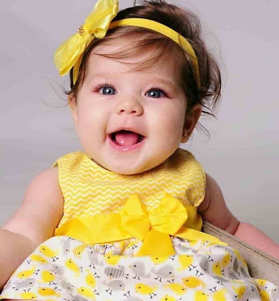 The captivating smile of a newborn: Mesmerizing all who see them. make the day brighter