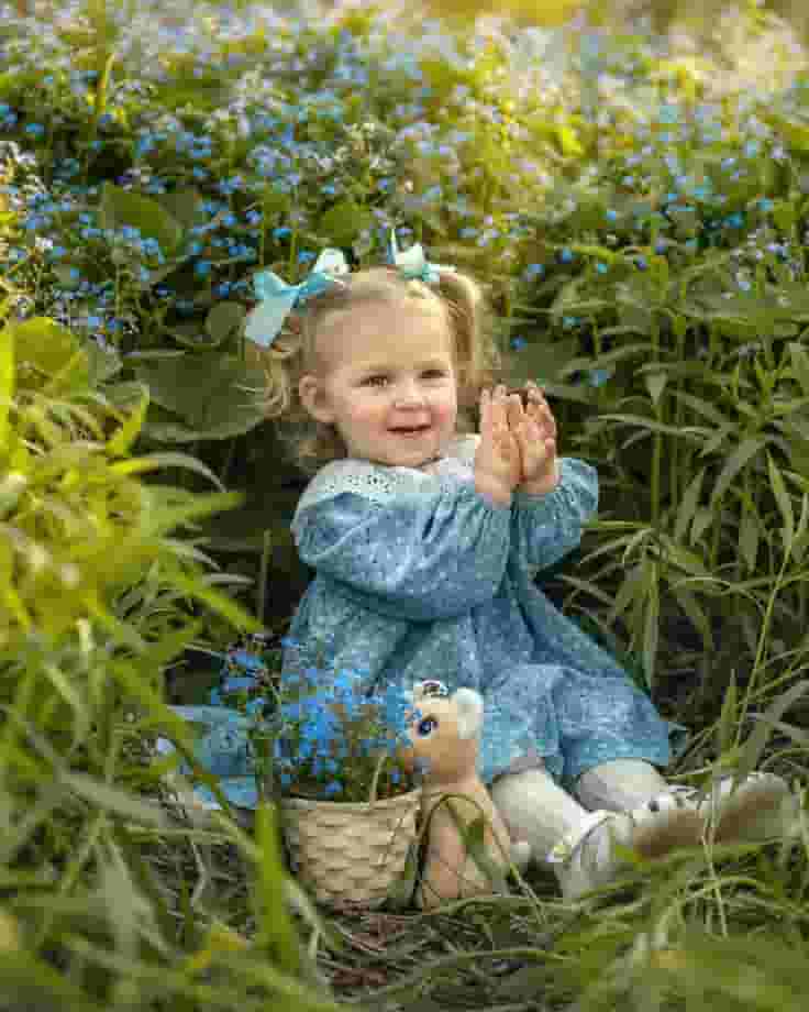 Immersed in a Flower Field: A Baby’s Delight in a World of Blossoms.hanh