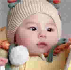 QL Heartwarming Scene: Young girl with rosy cheeks enjoying cake ‎